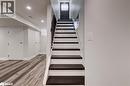 Stairway featuring wood finished floors and recessed lighting - 22 St James Street Unit# C, Brantford, ON  - Indoor Photo Showing Other Room 