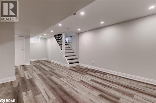 Finished basement featuring recessed lighting, stairway, and light wood finished floors - 22 St James Street Unit# C, Brantford, ON - Indoor