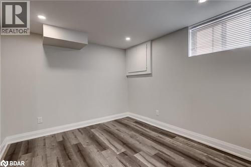 Below grade area featuring wood finished floors and recessed lighting - 22 St James Street Unit# C, Brantford, ON - Indoor Photo Showing Other Room
