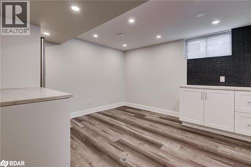 Basement featuring recessed lighting and light wood-type flooring - 22 St James Street Unit# C, Brantford, ON - Indoor