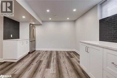 Unfurnished dining area featuring recessed lighting and light wood-style floors - 22 St James Street Unit# C, Brantford, ON - Indoor Photo Showing Other Room
