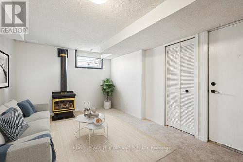 *VIRTUALLY STAGED* - 8 Gillespie Crescent, Ottawa, ON - Indoor With Fireplace