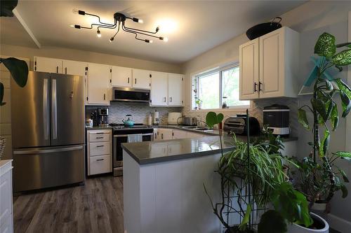 32 Vimy Road, Eriksdale, MB - Indoor Photo Showing Kitchen With Double Sink