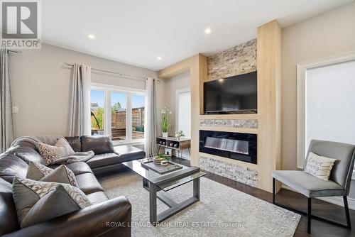 62 Helen Street, Kawartha Lakes (Bobcaygeon), ON - Indoor Photo Showing Living Room With Fireplace