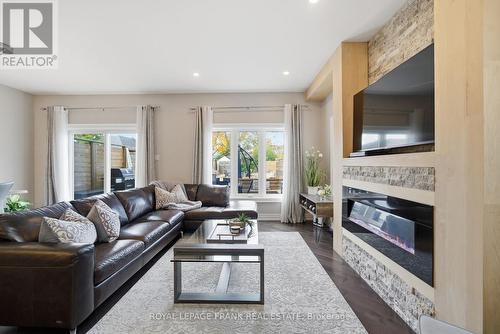 62 Helen Street, Kawartha Lakes (Bobcaygeon), ON - Indoor Photo Showing Living Room With Fireplace