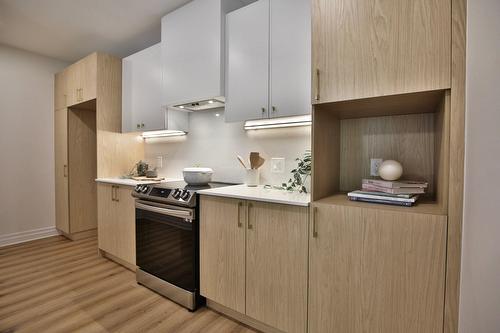 Cuisine - 406-2000 Rue Benoit, Saint-Bruno-De-Montarville, QC - Indoor Photo Showing Kitchen