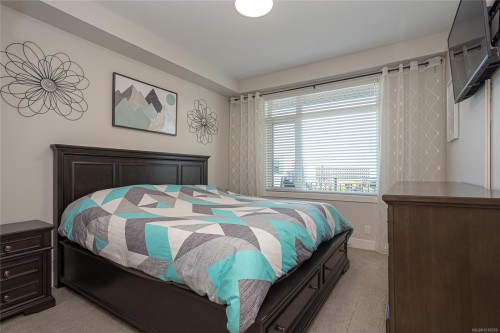 203-6540 Metral Dr, Nanaimo, BC - Indoor Photo Showing Bedroom