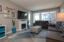 203-6540 Metral Dr, Nanaimo, BC  - Indoor Photo Showing Living Room With Fireplace 