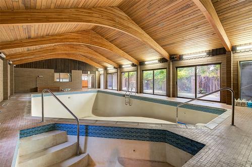 5090 Ash Road, Kelowna, BC - Indoor Photo Showing Other Room With In Ground Pool