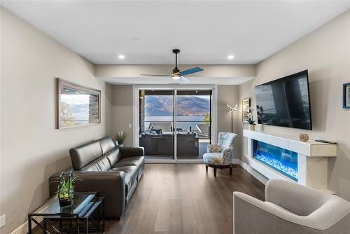104-3475 Granite Close, Kelowna, BC - Indoor Photo Showing Living Room With Fireplace