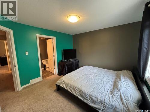 3 3225 Woodhams Drive E, Regina, SK - Indoor Photo Showing Bedroom
