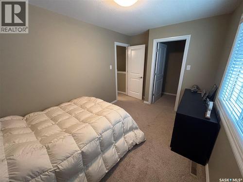 3 3225 Woodhams Drive E, Regina, SK - Indoor Photo Showing Bedroom
