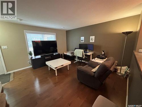 3 3225 Woodhams Drive E, Regina, SK - Indoor Photo Showing Living Room