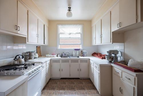 Cuisine - 4829 Rue Fulton, Montréal (Côte-Des-Neiges/Notre-Dame-De-Grâce), QC - Indoor Photo Showing Kitchen With Double Sink