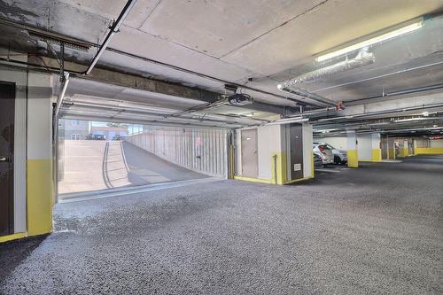 Stationnement - 103A-2355 Rue Du Barachois, Québec (Les Rivières), QC - Indoor Photo Showing Garage