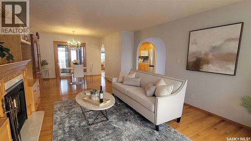 210 3Rd Street E, Vanscoy, SK - Indoor Photo Showing Living Room With Fireplace