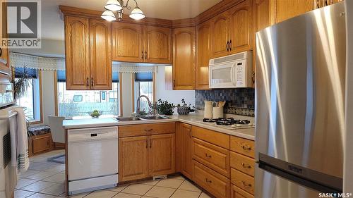 210 3Rd Street E, Vanscoy, SK - Indoor Photo Showing Kitchen With Double Sink