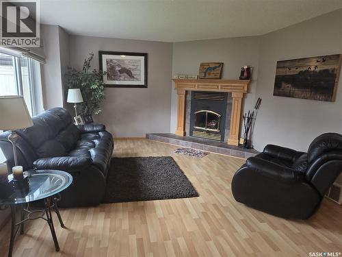 218 Ruby Drive, Coteau Rm No. 255, SK - Indoor Photo Showing Living Room With Fireplace