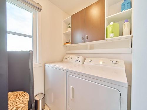 Salle de lavage - 387 Rue Collard, Alma, QC - Indoor Photo Showing Laundry Room