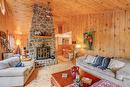 Living room - 1109 Ch. De La Paix, Saint-Sauveur, QC  - Indoor Photo Showing Living Room With Fireplace 