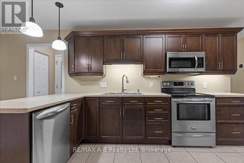 86 Windemere Crescent, Stratford, ON - Indoor Photo Showing Kitchen With Double Sink