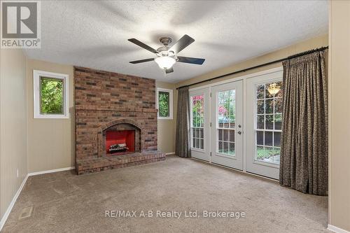 86 Windemere Crescent, Stratford, ON - Indoor With Fireplace