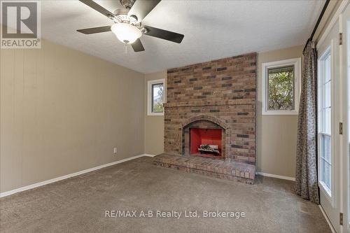 86 Windemere Crescent, Stratford, ON - Indoor With Fireplace
