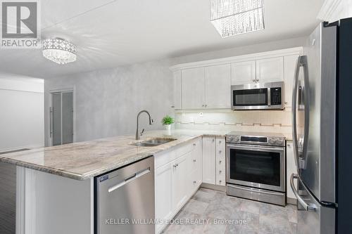 201 - 4013 Kilmer Drive, Burlington, ON - Indoor Photo Showing Kitchen With Stainless Steel Kitchen With Double Sink