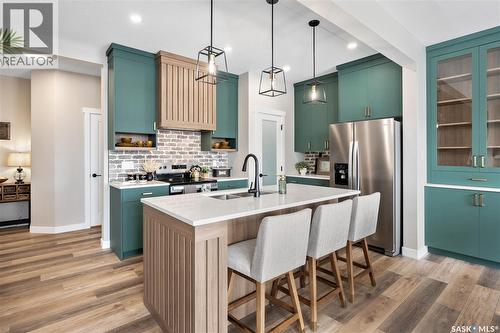 317 Veterans Drive, Warman, SK - Indoor Photo Showing Kitchen With Upgraded Kitchen