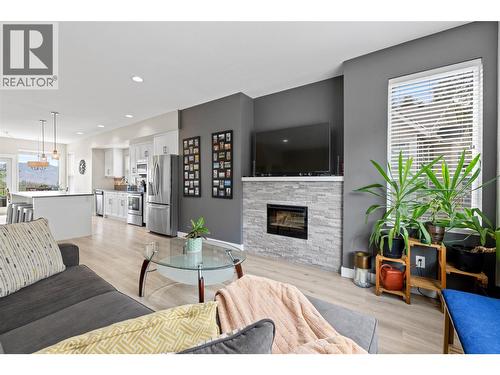 2490 Tuscany Drive Unit# 61, West Kelowna, BC - Indoor Photo Showing Living Room With Fireplace