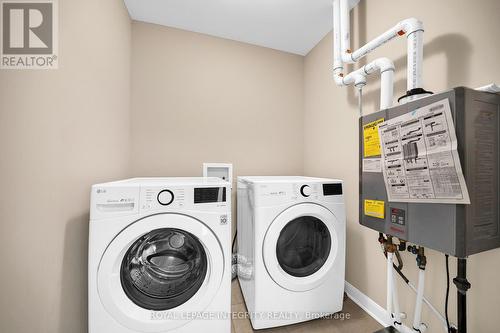 upstairs laundry - 210 Geyser Place, Ottawa, ON - Indoor Photo Showing Laundry Room