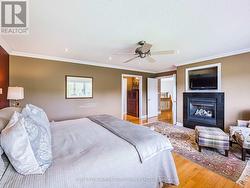 Primary suite with cozy fireplace - 