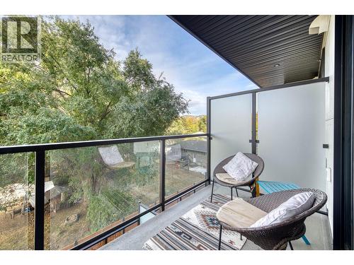 West Facing Patio - large tree is being removed eventually - 1274 Devonshire Avenue Unit# 306, Kelowna, BC - Outdoor With Exterior