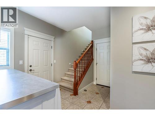 Stairs up to loft/office - 5575 Highway 6 Highway, Coldstream, BC - Indoor Photo Showing Other Room