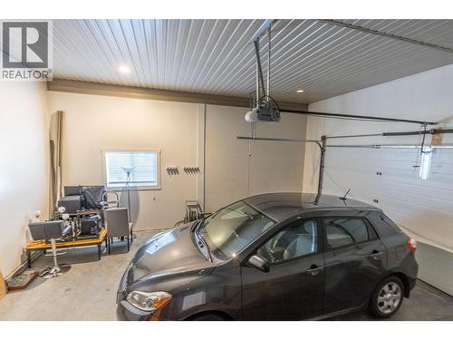 Attached Garage - 5575 Highway 6 Highway, Coldstream, BC - Indoor Photo Showing Garage