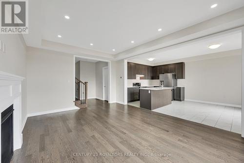 12 Mundell Road, Erin, ON - Indoor Photo Showing Kitchen With Fireplace