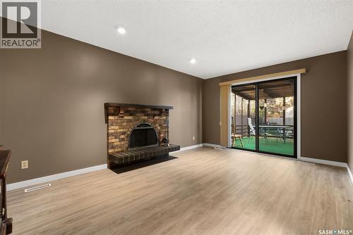 2119 Elderkin Drive E, Regina, SK - Indoor With Fireplace