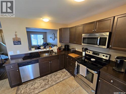 6 815 5Th Street Ne, Weyburn, SK - Indoor Photo Showing Kitchen With Stainless Steel Kitchen With Double Sink