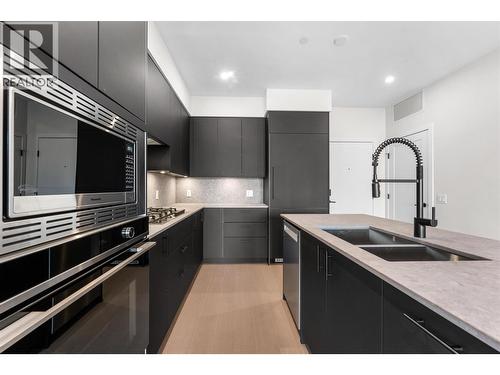 9654 Benchland Road Unit# 407, Lake Country, BC - Indoor Photo Showing Kitchen With Double Sink With Upgraded Kitchen