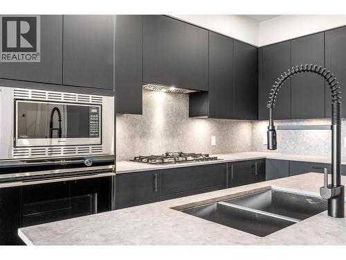 9654 Benchland Road Unit# 407, Lake Country, BC - Indoor Photo Showing Kitchen With Double Sink With Upgraded Kitchen