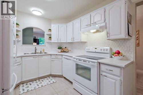 1170 Brookside Avenue Unit# 209, Kelowna, BC - Indoor Photo Showing Kitchen With Double Sink