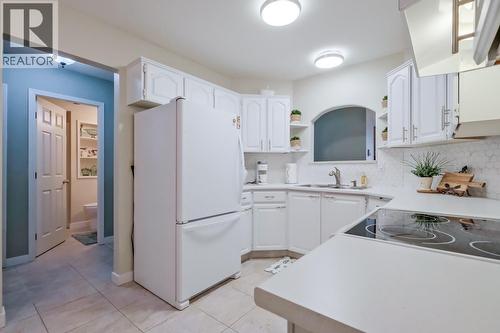 1170 Brookside Avenue Unit# 209, Kelowna, BC - Indoor Photo Showing Kitchen With Double Sink
