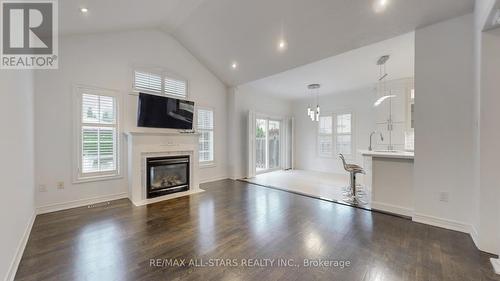 2400 Tesla Crescent, Oakville, ON - Indoor Photo Showing Living Room With Fireplace