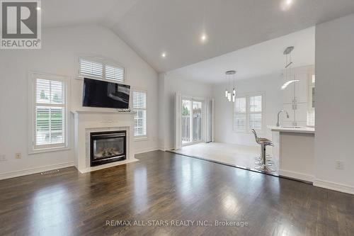 2400 Tesla Crescent, Oakville, ON - Indoor Photo Showing Living Room With Fireplace