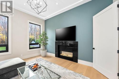 98 Mcrae Beach Road S, Georgina, ON - Indoor Photo Showing Living Room With Fireplace