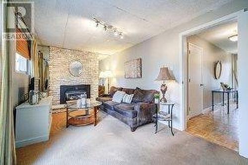 33 Groveland Crescent, Brampton, ON - Indoor Photo Showing Living Room With Fireplace