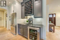 Great beverage centre space complete with wine fridge and wine racks! - 