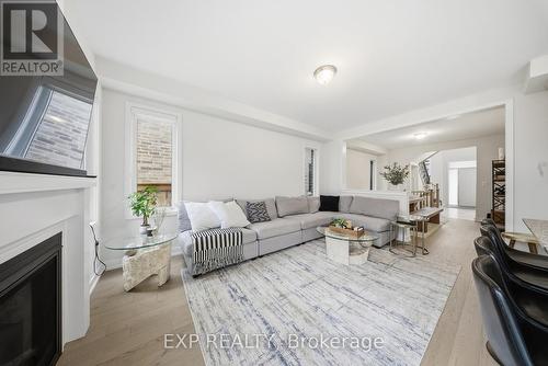 617 Etheridge Avenue, Milton, ON - Indoor Photo Showing Living Room With Fireplace