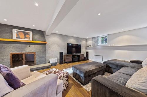 Family room - 418 Rue De Grenoble, Sainte-Julie, QC - Indoor Photo Showing Living Room With Fireplace