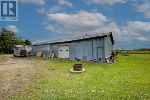 Heated workshop with garage, & lg Drive Shed - 713630 Durham Road B, Grey Highlands, ON 